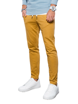 Męskie spodnie dresowe Ombre P946 w kolorze musztardowym